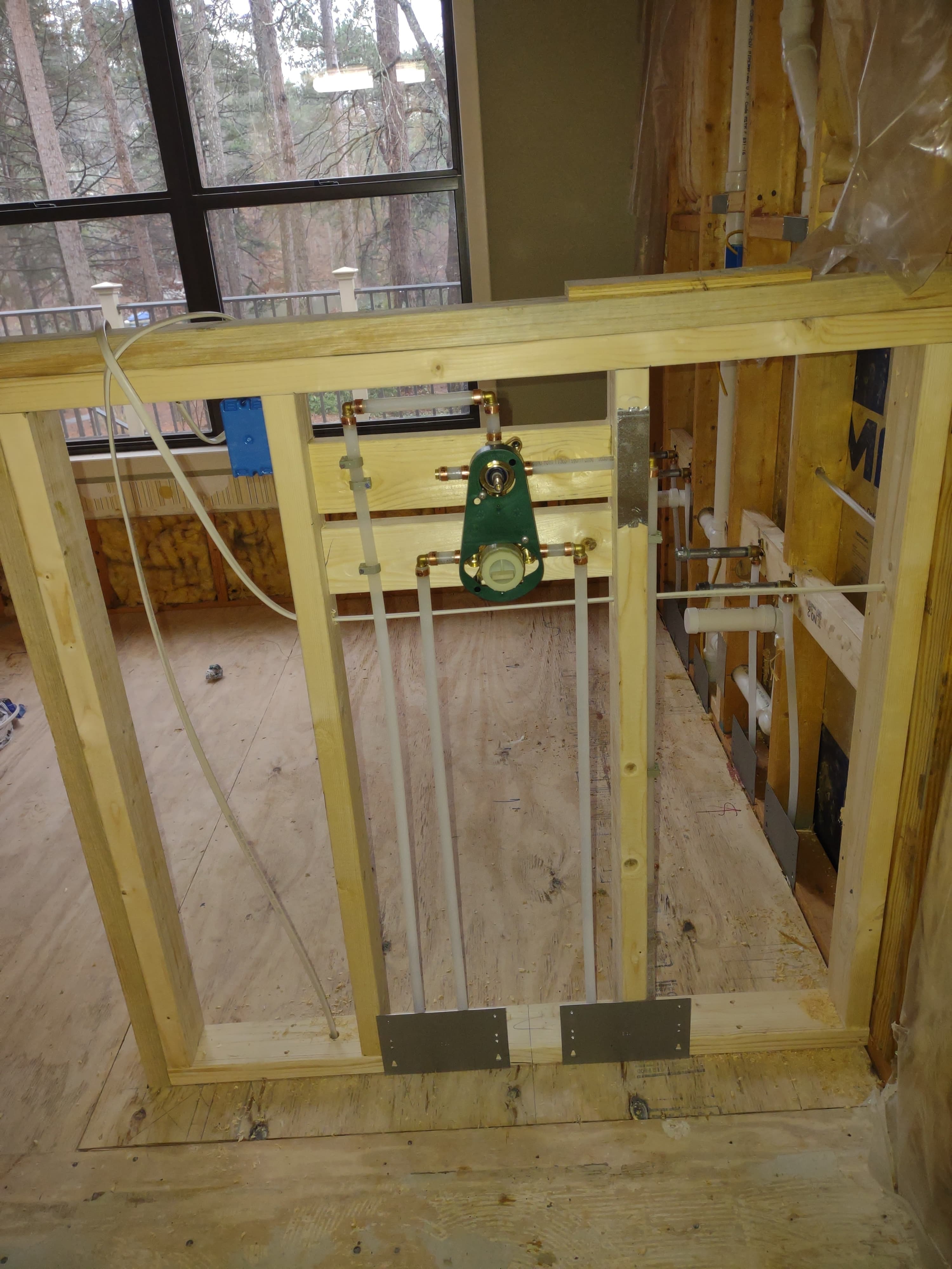 1st picture of a new construction plumbing install.